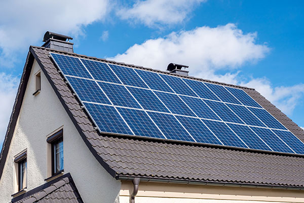 Solar panels on glazed tile roofs